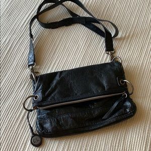 Black leather cross body bag.